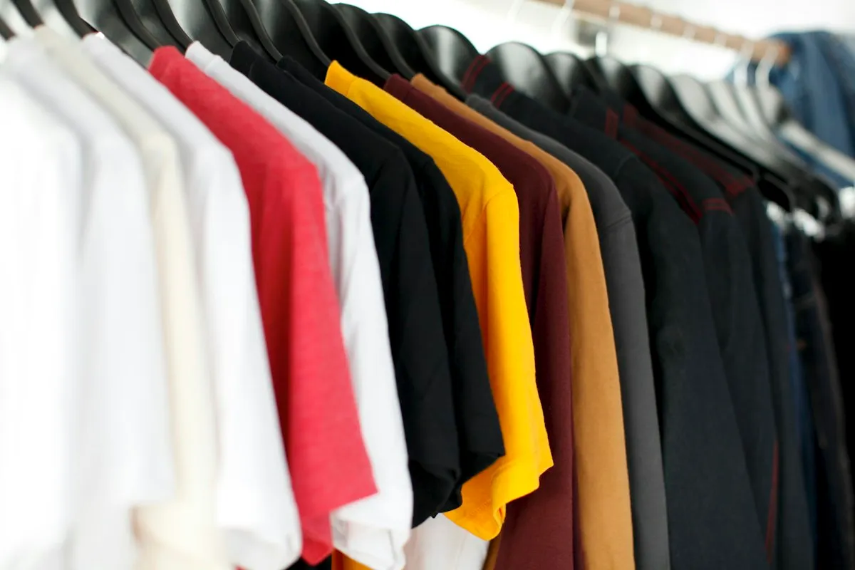 Shirts in several colours on hangers